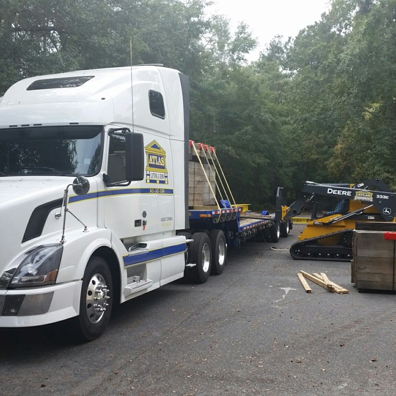 Atlas Lifting & Demo LLC semi-truck and John Deere skid steer ready for a job in Hilton Head Island, SC