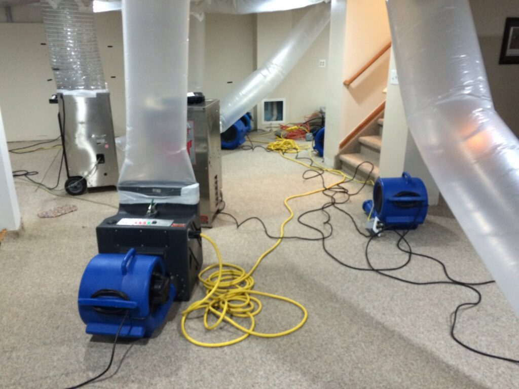 Basement with extensive drying equipment for water damage restoration by Complete Restoration and Construction, LLC in Yakima, WA