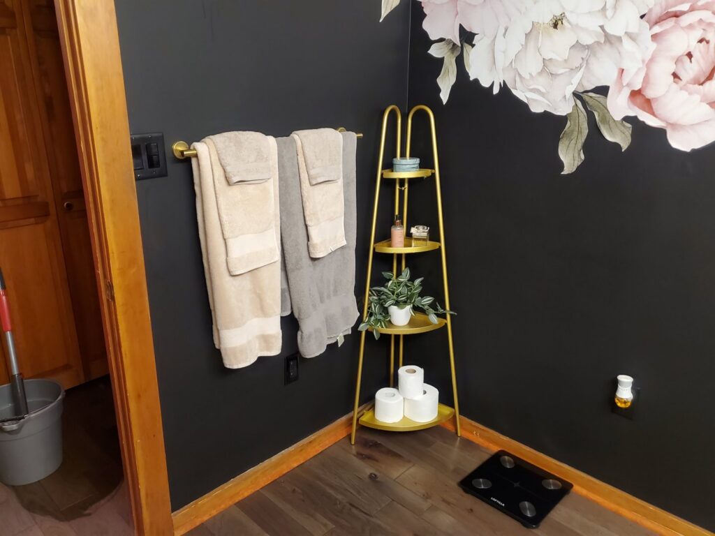 A bathroom with a mop and bucket visible, ready for or just after a thorough cleaning by Maids of Hartford in Hartford, CT.