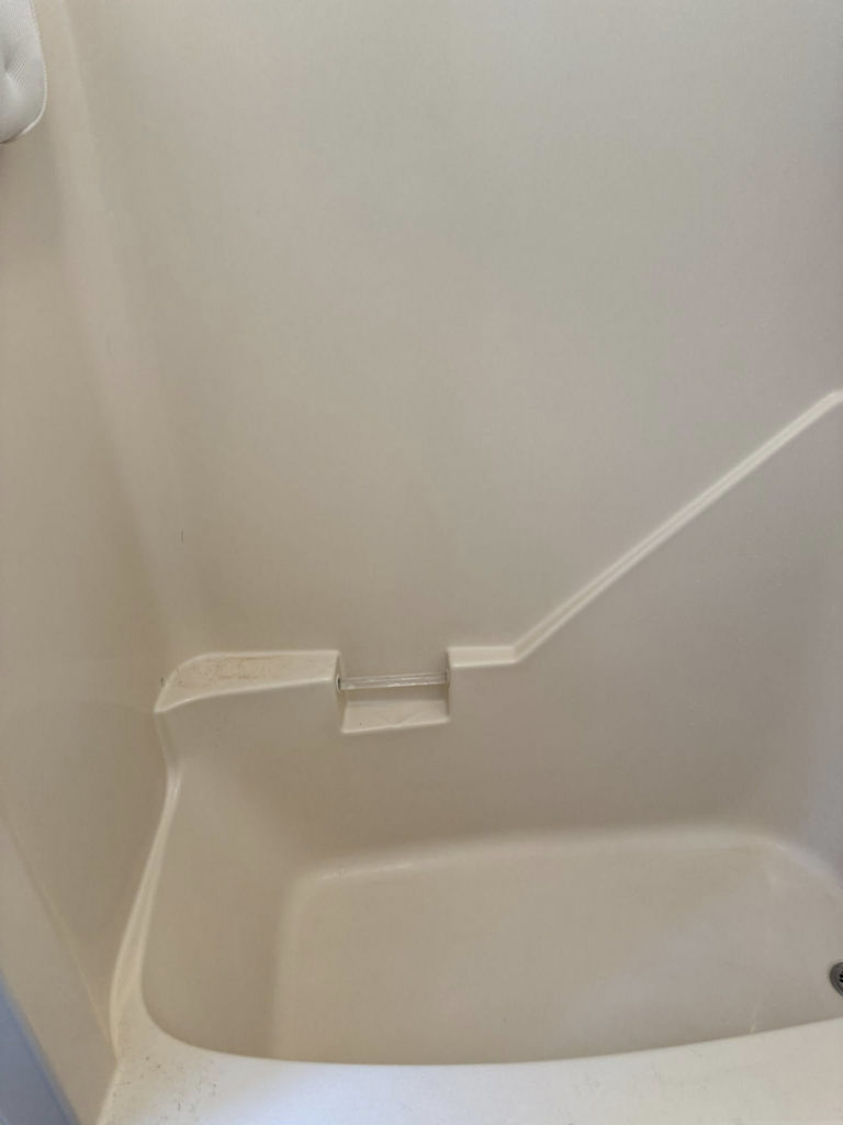 A bathtub showing grime and dirt before a professional cleaning service from Spotless Cleaning Operations LLC in Lancaster, PA.