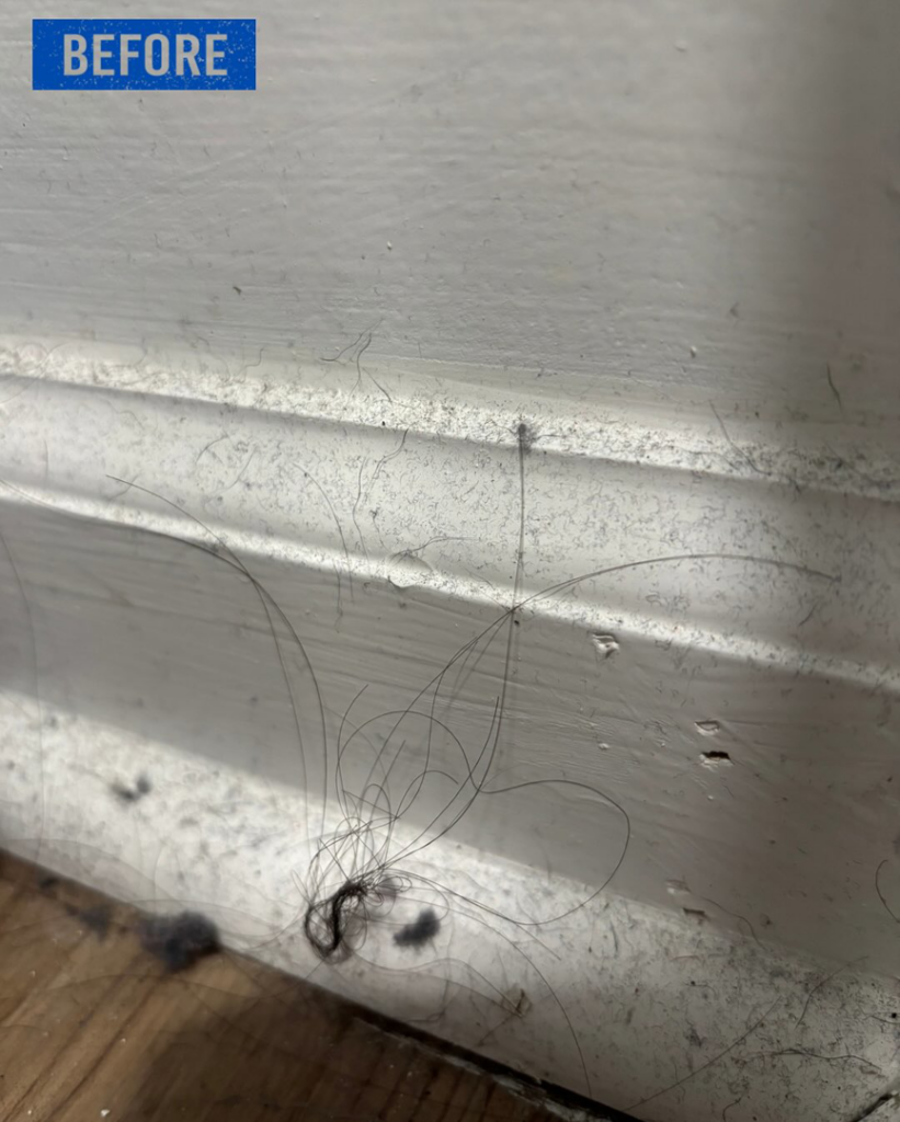 Dirty baseboards covered in dust and hair before cleaning by Top Tier Philly in Philadelphia, PA.