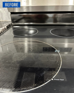 A close-up of a dirty glass stovetop before cleaning by Top Tier Philly in Philadelphia, PA.