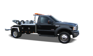 A black wrecker tow truck ready for service from St Pete Towing Services in Saint Petersburg, FL.