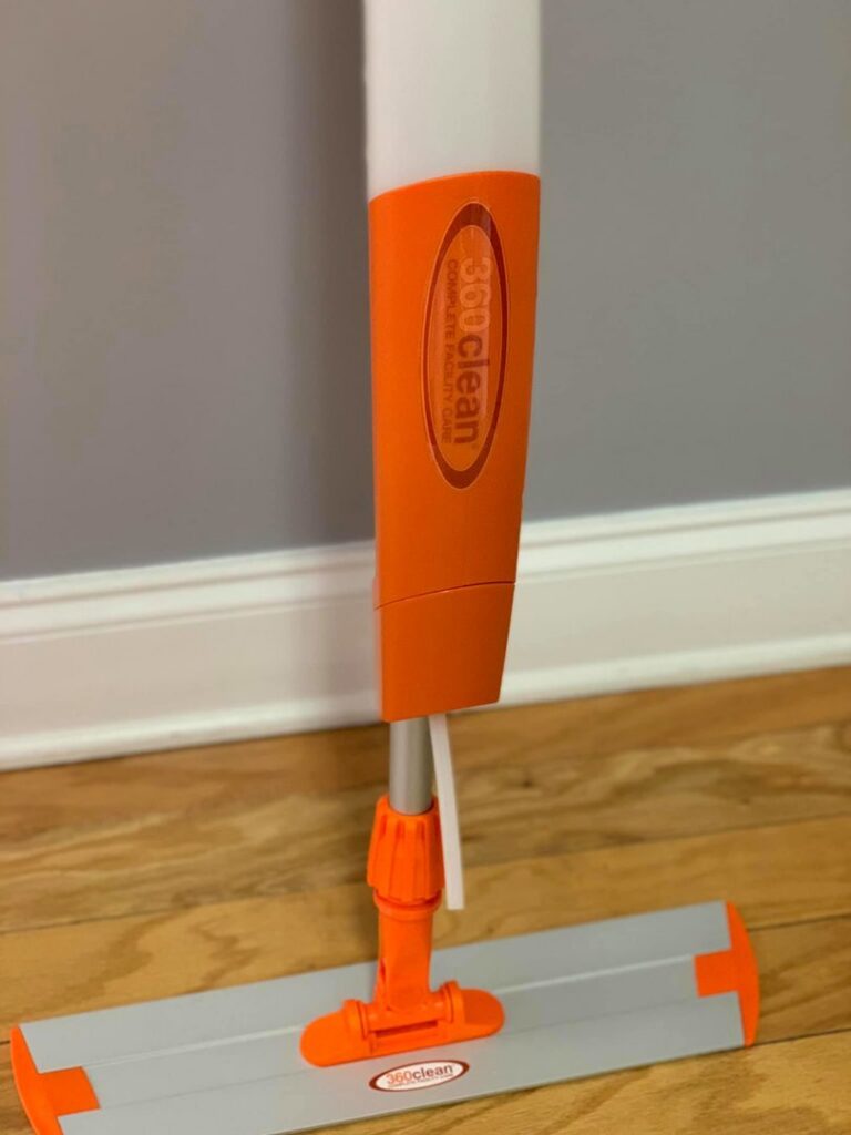 A 360clean branded mop resting on a clean wooden floor, ready for house cleaning in North Charleston, SC