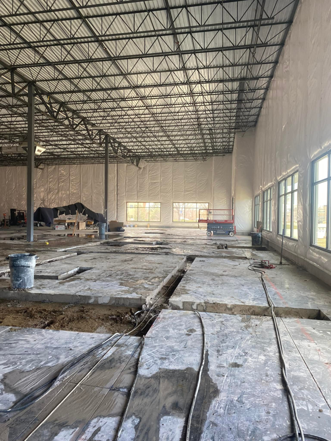 The interior of a building showing concrete floor sections removed by Independent Concrete Cutter Corp. in Denver, CO.