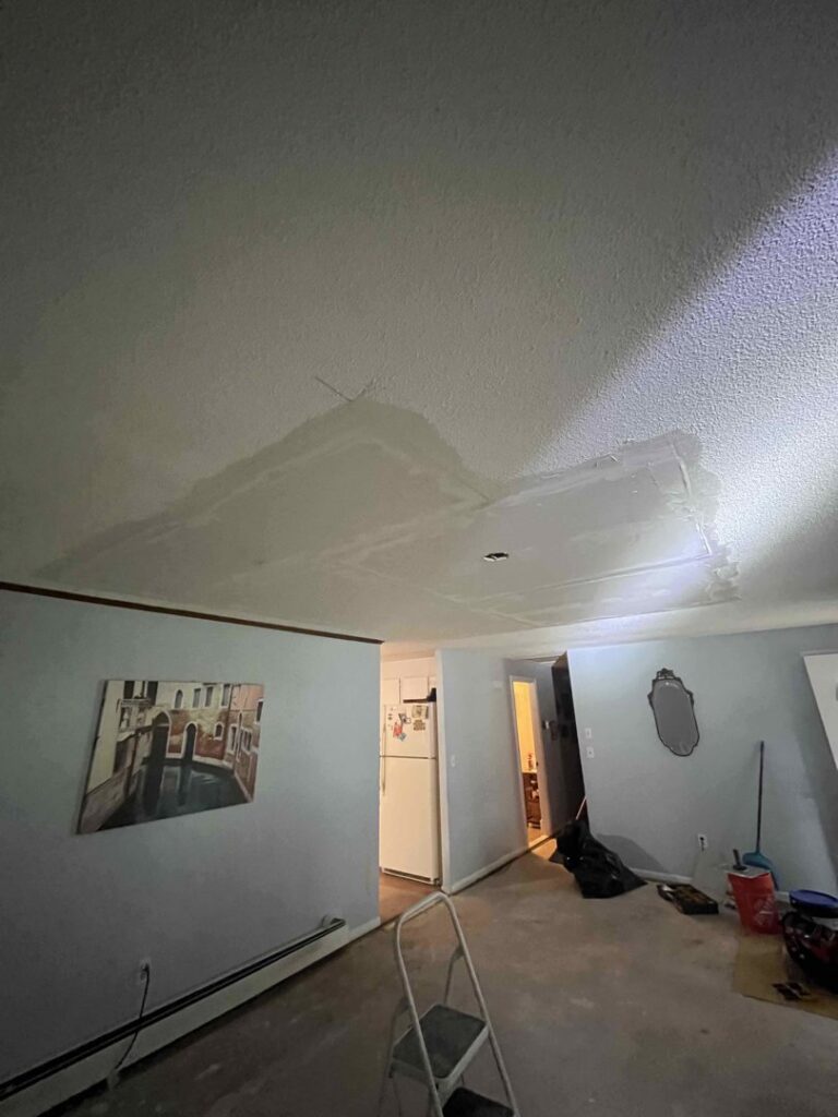 A ceiling showing significant water damage and stains, indicating a need for remediation by RestoPros of Hartford in West Hartford, CT.