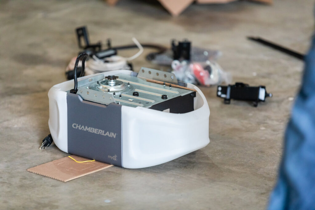 A close-up of a Chamberlain garage door opener unit, ready for installation by Bob McDonald Garage Door LLC in Columbus, NE.