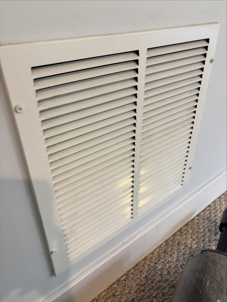 A sparkling clean air vent after professional cleaning by Tidy Townhouses in Manchester, NH.