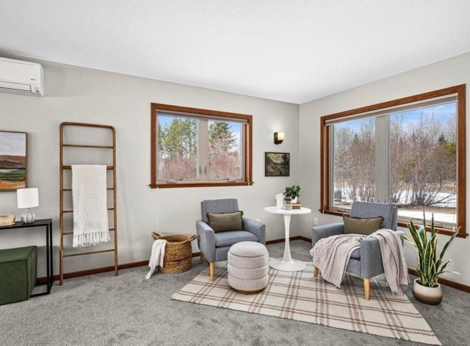 A clean and organized sitting room, highlighting the thorough house cleaning provided by Tidy Details in Duluth, MN.