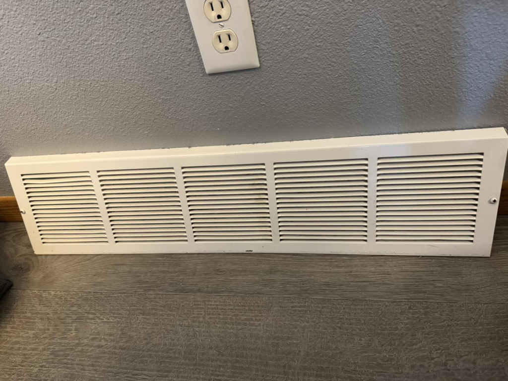 A sparkling clean baseboard heater vent after professional cleaning by Wicked Clean in Bismarck, ND.