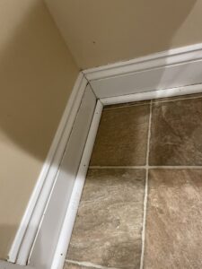 A clean baseboard in a residential room, showcasing the results of professional cleaning by Deep Cleaning Service in Frederick, MD.