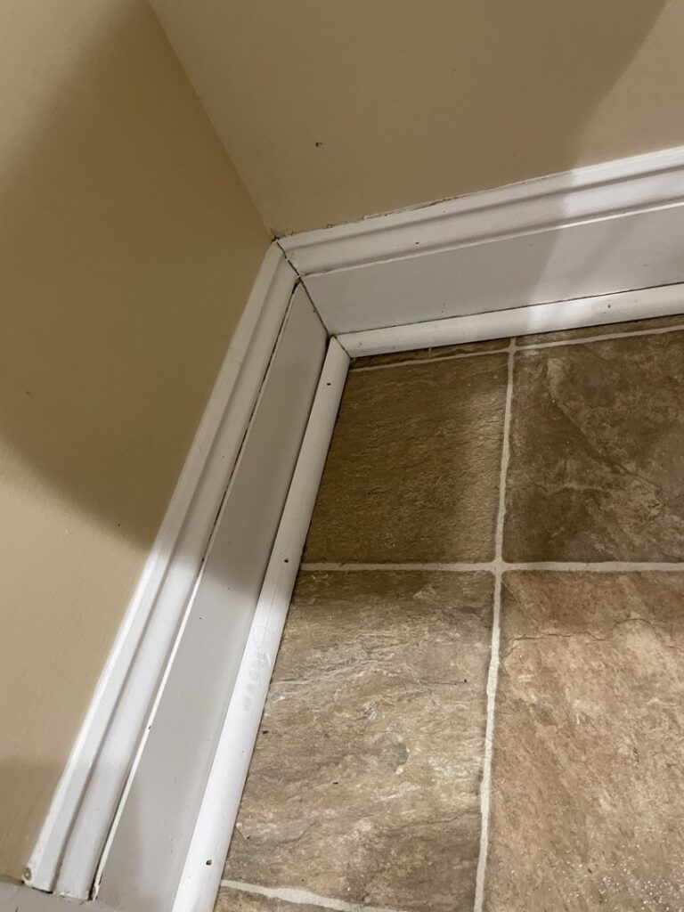A clean baseboard in a residential room, showcasing the results of professional cleaning by Deep Cleaning Service in Frederick, MD.