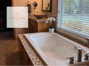 A beautifully clean bathroom with a large bathtub and vanity, professionally cleaned by Estela's Cleaning Service's in Lake Elmo, MN.