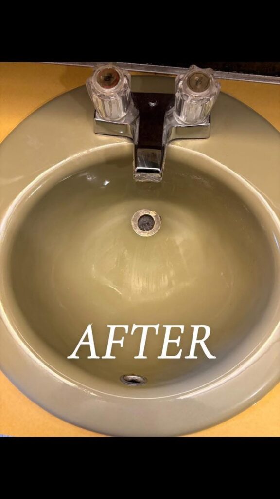 A clean green bathroom sink after professional cleaning by Teri Lynn's Cleaning in Williston, ND.