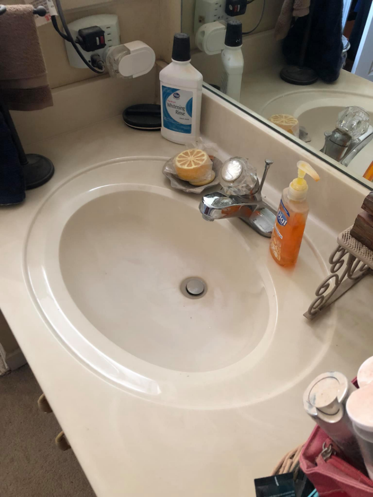 A sparkling clean bathroom sink, showcasing the quality house cleaning service from Natalie's Cleaning and Dog Sitting Service in Memphis, TN.