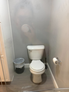 A sparkling clean bathroom toilet area, meticulously cleaned by Spotless by Sam LLC in Green Bay, WI.
