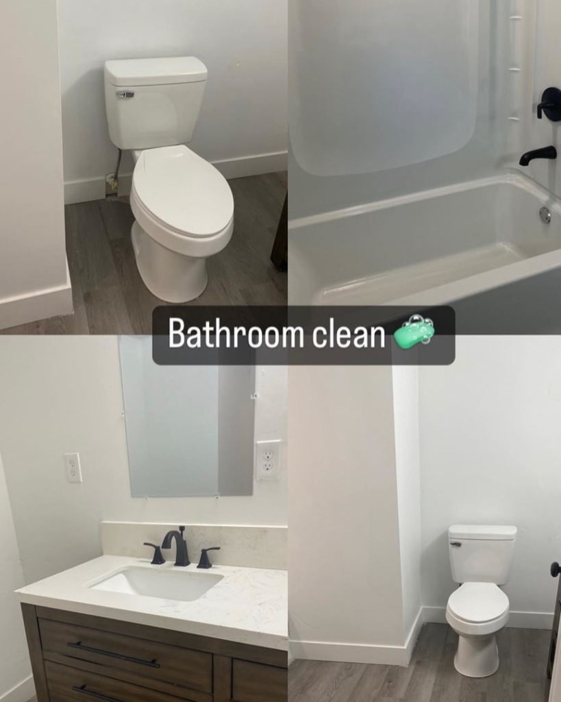 A sparkling clean bathroom featuring a toilet, bathtub, and vanity, showcasing the quality work of Hernanz Family Cleaning Services LLC in West Valley City, UT.