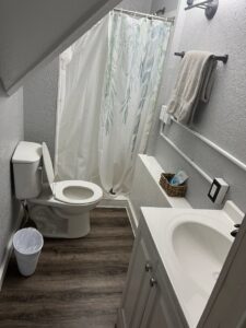 A fully cleaned bathroom featuring a toilet, sink, and shower, demonstrating the comprehensive service of Final Touch & More in Fort Wayne, IN