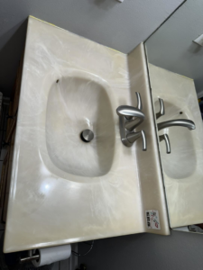 A clean bathroom vanity and sink after professional cleaning by Lake Area Cleaning Services in Lake Charles, LA