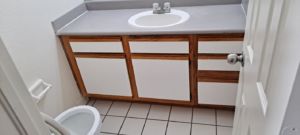 A sparkling clean bathroom vanity and sink, demonstrating the thorough cleaning services of Solid Rock Cleaning Company LLC in Orlando, FL