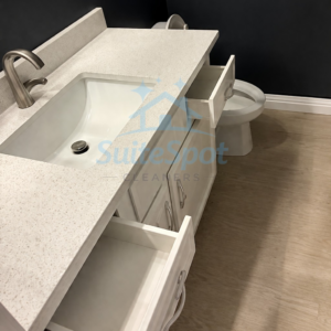 A meticulously cleaned bathroom vanity and sink by SuiteSpot Cleaners, a trusted house cleaner in Las Vegas, NV.
