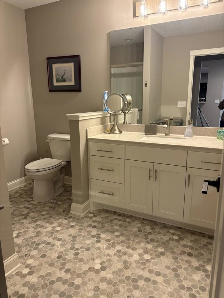A spotless bathroom with a clean vanity and toilet, showcasing the work of Estela's Cleaning Service's in Lake Elmo, MN.