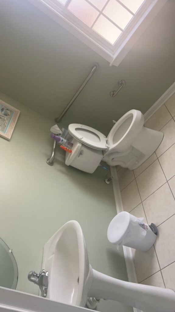 A freshly cleaned bathroom featuring a pristine sink and toilet by Cinderellas Cleaning in Cerritos, CA