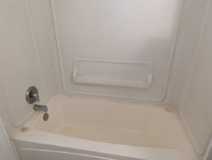 A sparkling clean bathtub after a thorough cleaning service provided by The Cleaning Fairy in Fort Lauderdale, FL.