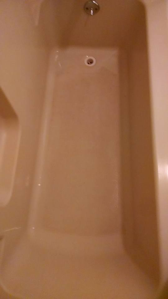 A sparkling clean bathtub after professional house cleaning service by Antioch Professional Cleaning in Manchester, NH.