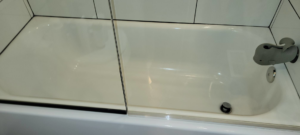 A sparkling clean bathtub and shower screen, showcasing the quality cleaning services by Rachel Blume Residential Cleaning Specialist in Sheridan, WY.
