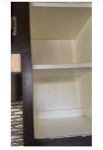 Clean cabinet shelves, showcasing the results of a professional cleaning by Bee-Dazzled Cleaning Service in Long Beach, CA.