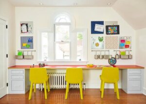 A clean and organized children's study area with yellow chairs, reflecting the meticulous cleaning by YQP Cleaning Services in Miami, FL.