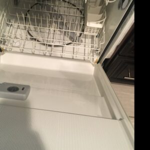 The sparkling clean interior of a dishwasher after professional cleaning by Magic Maids in Bremen, AL.