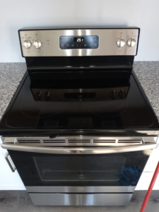 A gleaming clean electric stove top and oven after professional cleaning by Little Springs Cleaning in Chattanooga, TN.