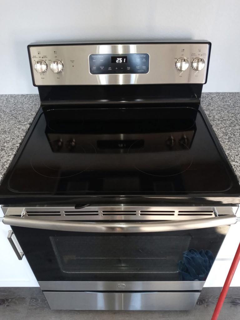 A gleaming clean electric stove top and oven after professional cleaning by Little Springs Cleaning in Chattanooga, TN.