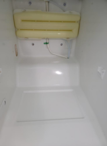 A sparkling clean freezer interior after professional cleaning by Windham Cleaning in Akron, OH.