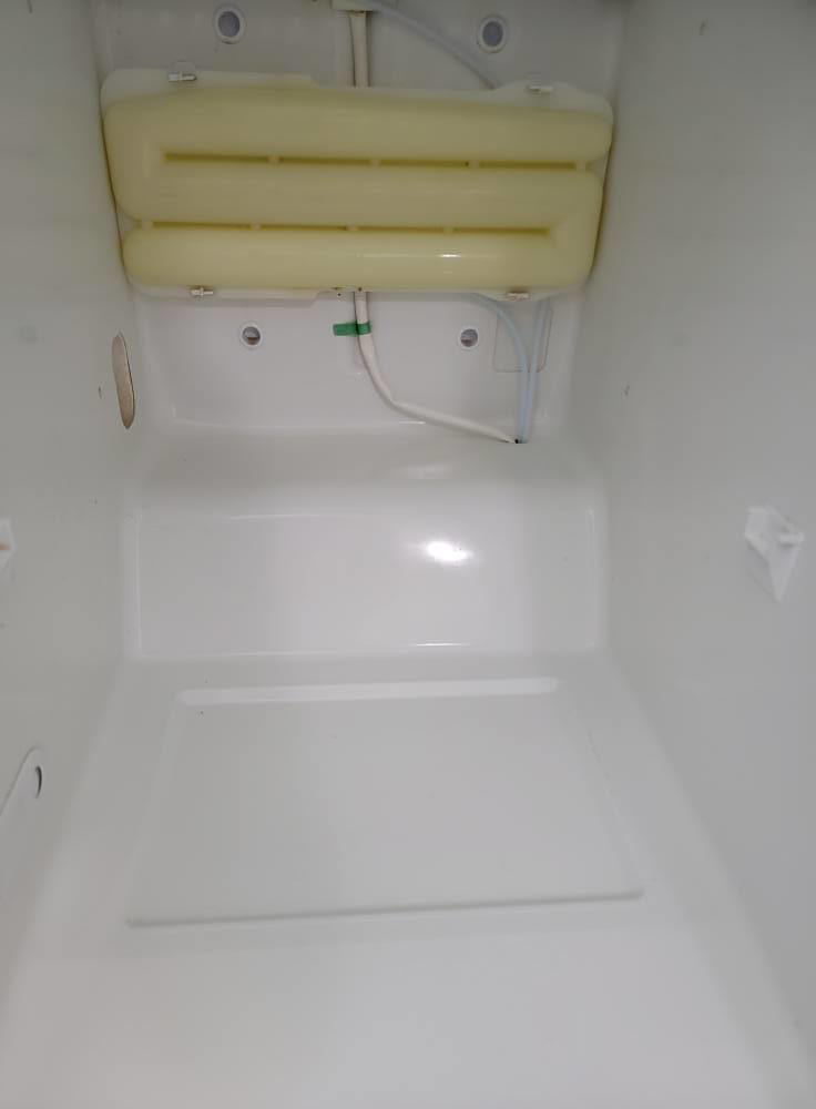 A sparkling clean freezer interior after professional cleaning by Windham Cleaning in Akron, OH.