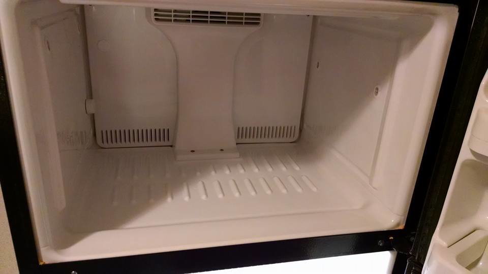 The spotless interior of a freezer after a thorough cleaning by Antioch Professional Cleaning in Manchester, NH.
