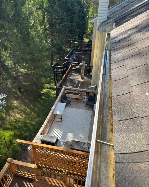 A sparkling clean house gutter after professional cleaning service by Procleanersofdmv in Rockville, MD.