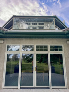 The sparkling clean exterior windows of a house after service by Splash Pros Pressure Washing in Reno, NV.