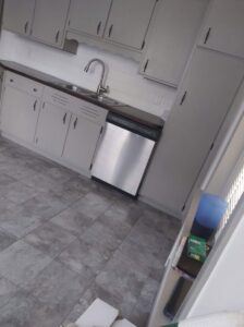 A clean kitchen showing cabinets, sink, and dishwasher after professional cleaning by Rebeccas Customized Cleaning LLC in Reading, PA.