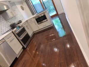 A clean kitchen with sparkling, shiny floors after professional cleaning by Rebeccas Customized Cleaning LLC in Reading, PA.