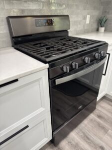 A clean kitchen stove and countertop, demonstrating attention to detail by Cleaning with Lisseth in Madison, WI.