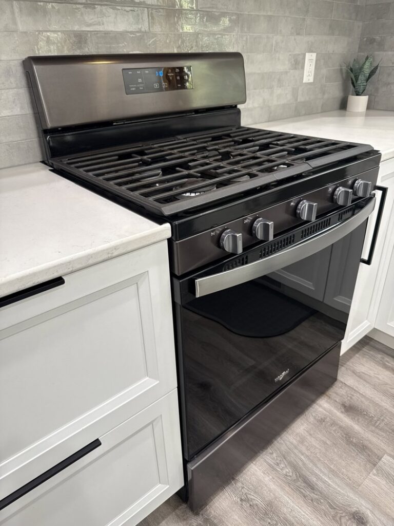 A clean kitchen stove and countertop, demonstrating attention to detail by Cleaning with Lisseth in Madison, WI.