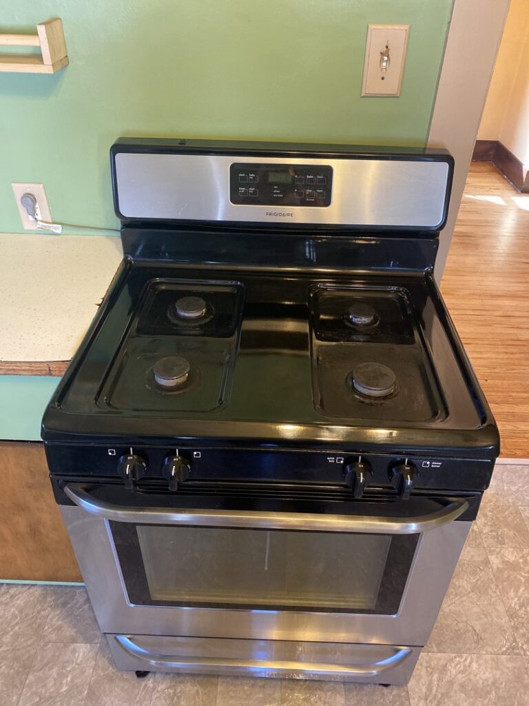 A sparkling clean kitchen stove and oven, demonstrating the detailed appliance cleaning by Final Touch & More in Fort Wayne, IN