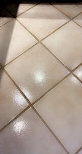 A shiny, clean kitchen tile floor, demonstrating the high-quality cleaning service provided by JLJ Sister's Cleaning & More in Lexington, KY.