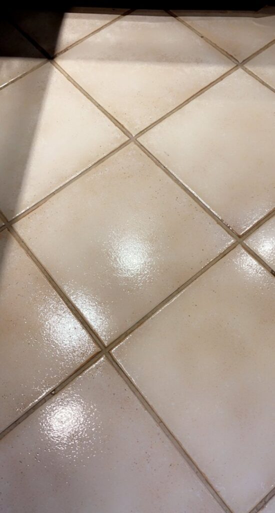 A shiny, clean kitchen tile floor, demonstrating the high-quality cleaning service provided by JLJ Sister's Cleaning & More in Lexington, KY.