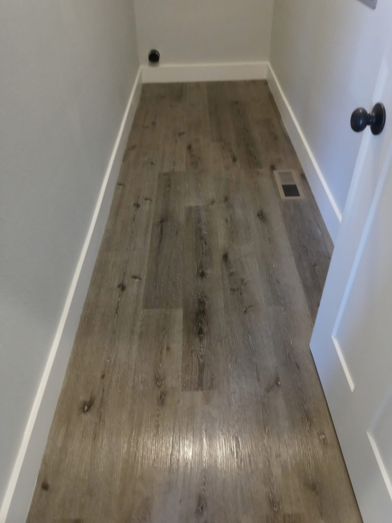 A sparkling clean laundry room floor after professional cleaning by Little Springs Cleaning in Chattanooga, TN.