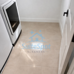A freshly cleaned laundry room floor, showcasing the quality work of SuiteSpot Cleaners in Las Vegas, NV.