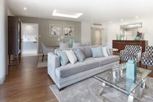 A clean and well-arranged living and dining area, showcasing the results of house cleaning by Cleaning with Lisseth in Madison, WI.